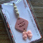 REAR VIEW MIRROR HANGING CHARM -SMUT SLUT BOW